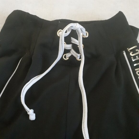 Justice Girl's Size 18/20 Black Gold Spell Out Lace Front Leggings - Picture 2 of 9